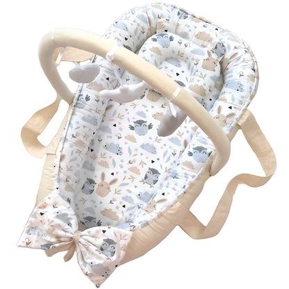 Front view of organic baby sleep cocoon on a white background.