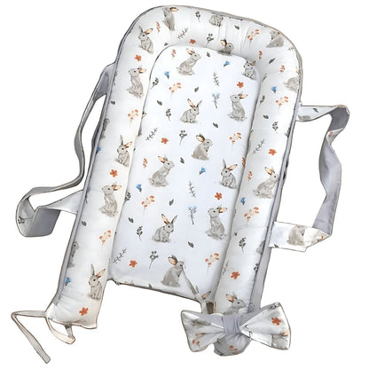 Side view of baby sleep cocoon showing adjustable straps